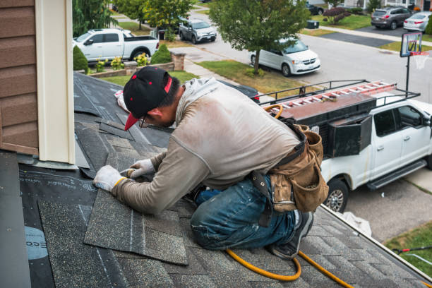 Professional Roofing technician working in Batson, TX